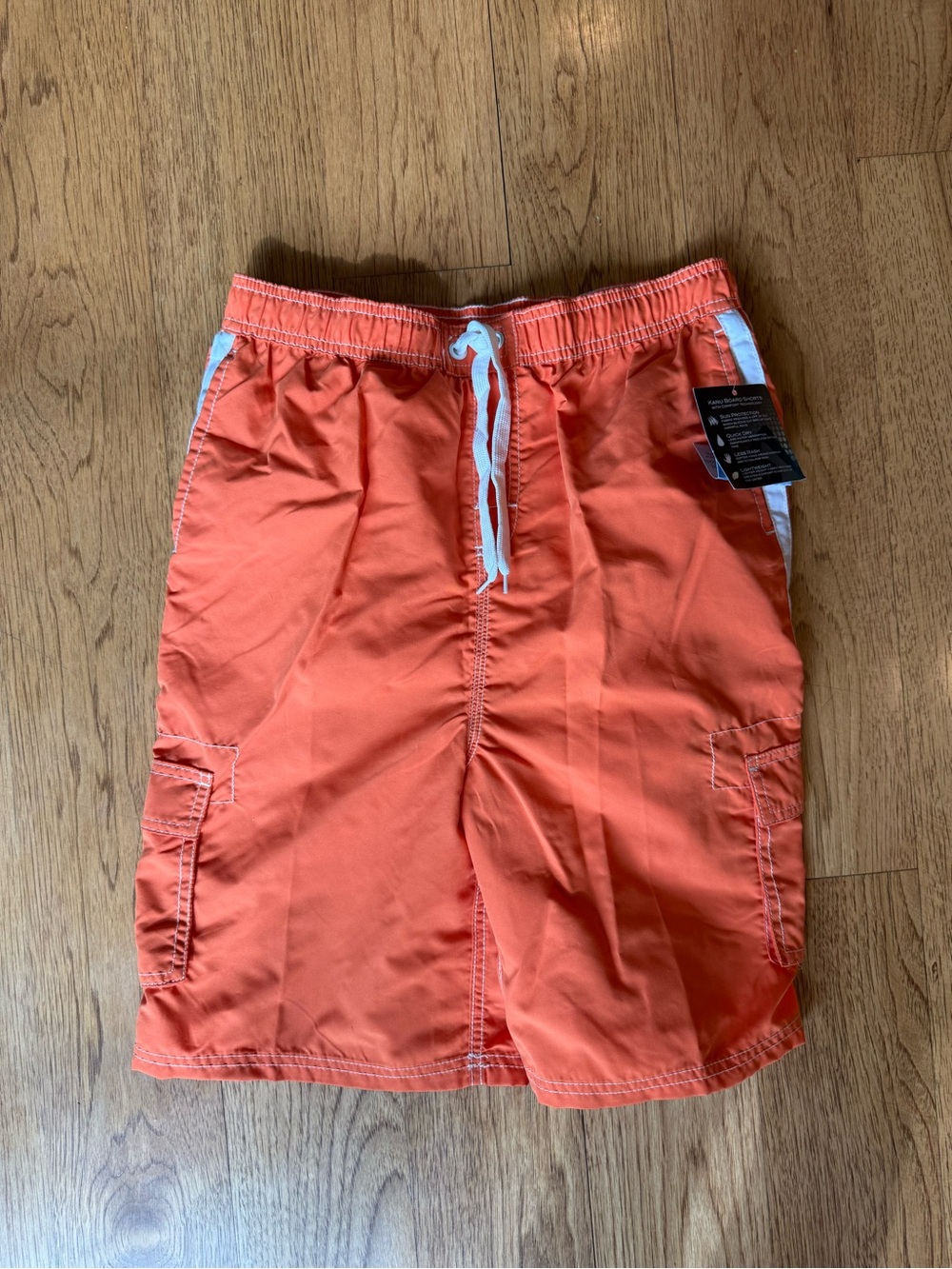 Kanu Surf Men's Coral-Orange Swim Trunks with White Drawstring